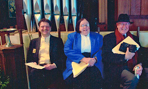 Rev. Mary Moore in front of the Organ